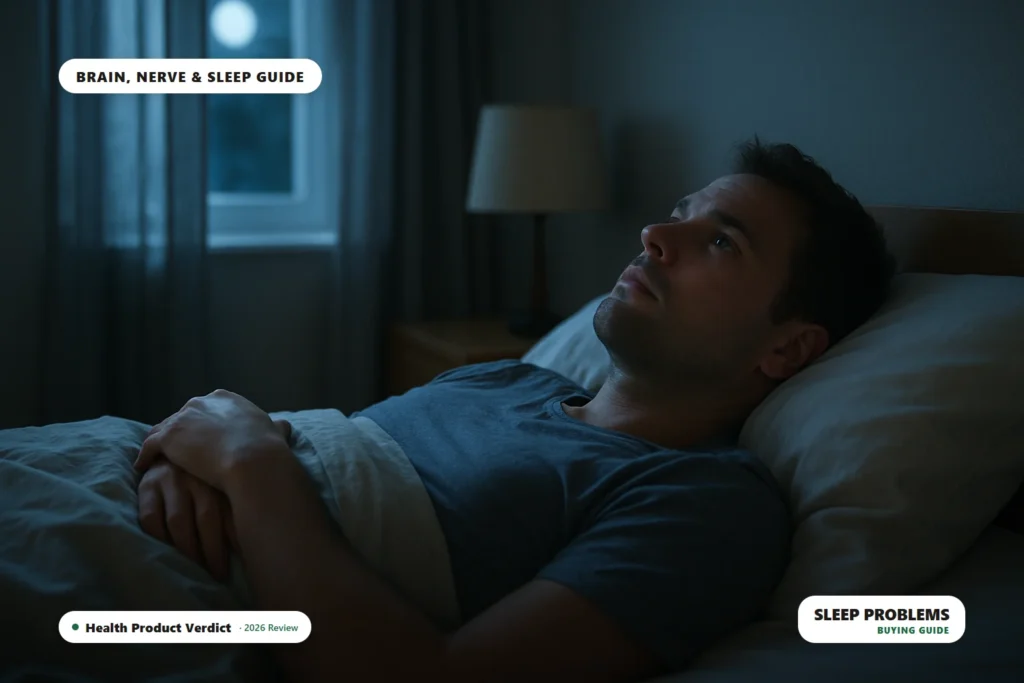 sleep problems - person lying awake in bed at night